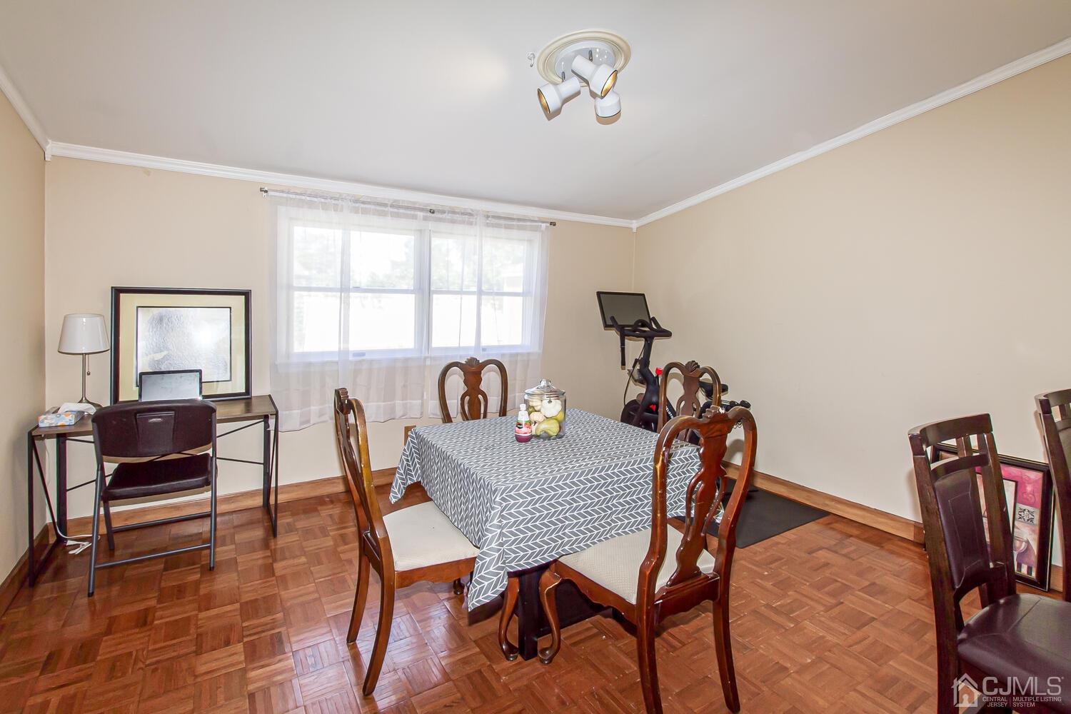 29 Ashley Road Edison, NJ 08817 - Photo 11 of 30 a view of a dining room with furniture and a window