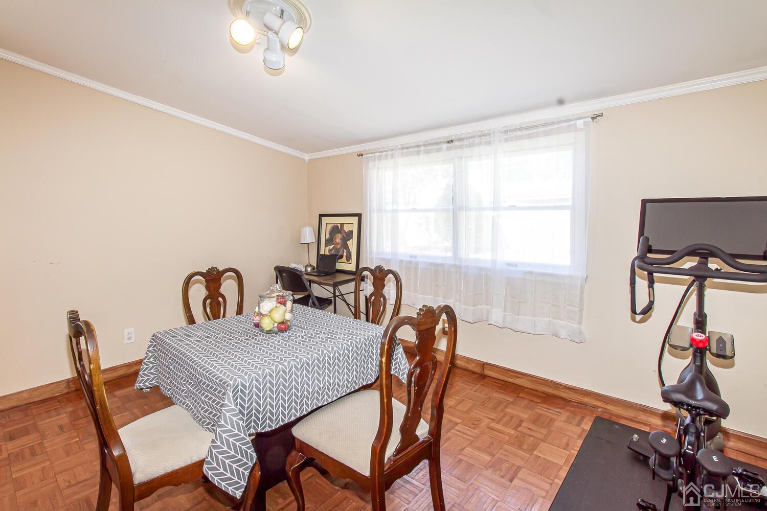 29 Ashley Road Edison, NJ 08817 - Photo 12 of 30 a view of a dining room with furniture and a window