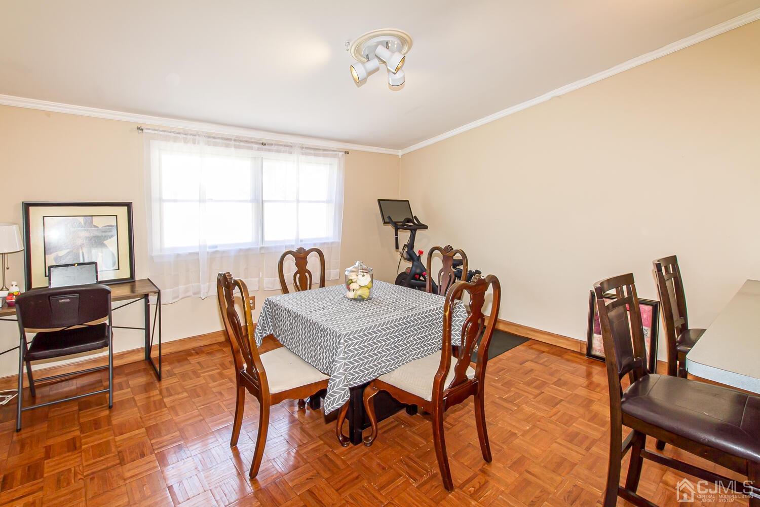 29 Ashley Road Edison, NJ 08817 - Photo 15 of 30 a view of a dining room with furniture and a window