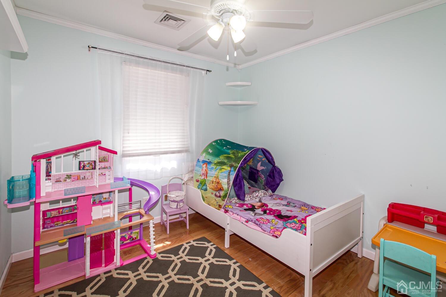 29 Ashley Road Edison, NJ 08817 - Photo 21 of 30 a room with toys and dresser