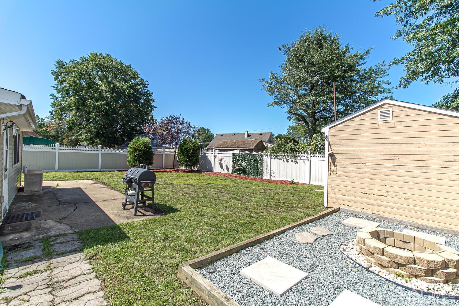29 Ashley Road Edison, NJ 08817 - Photo 24 of 30 a view of a backyard