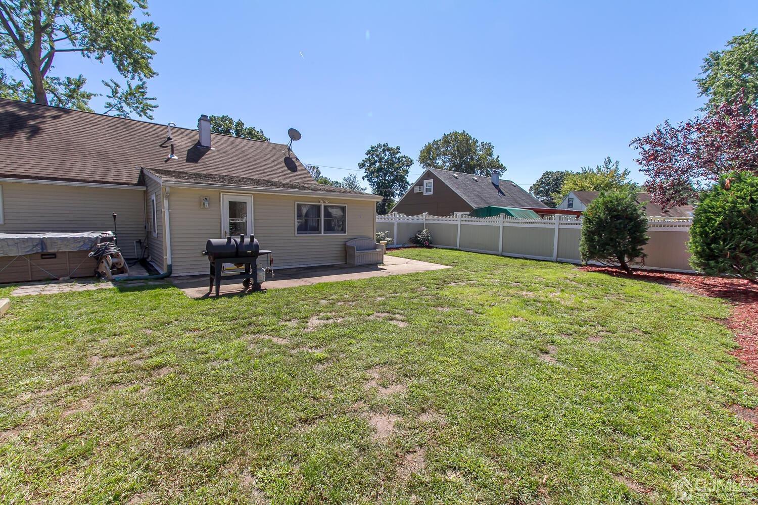 29 Ashley Road Edison, NJ 08817 - Photo 25 of 30 a view of a house with backyard and sitting area