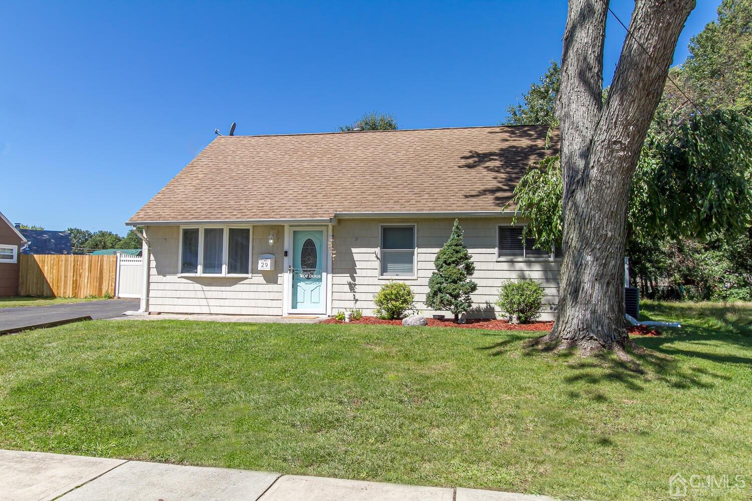 29 Ashley Road Edison, NJ 08817 - Photo 29 of 30 a front view of a house with a yard and porch