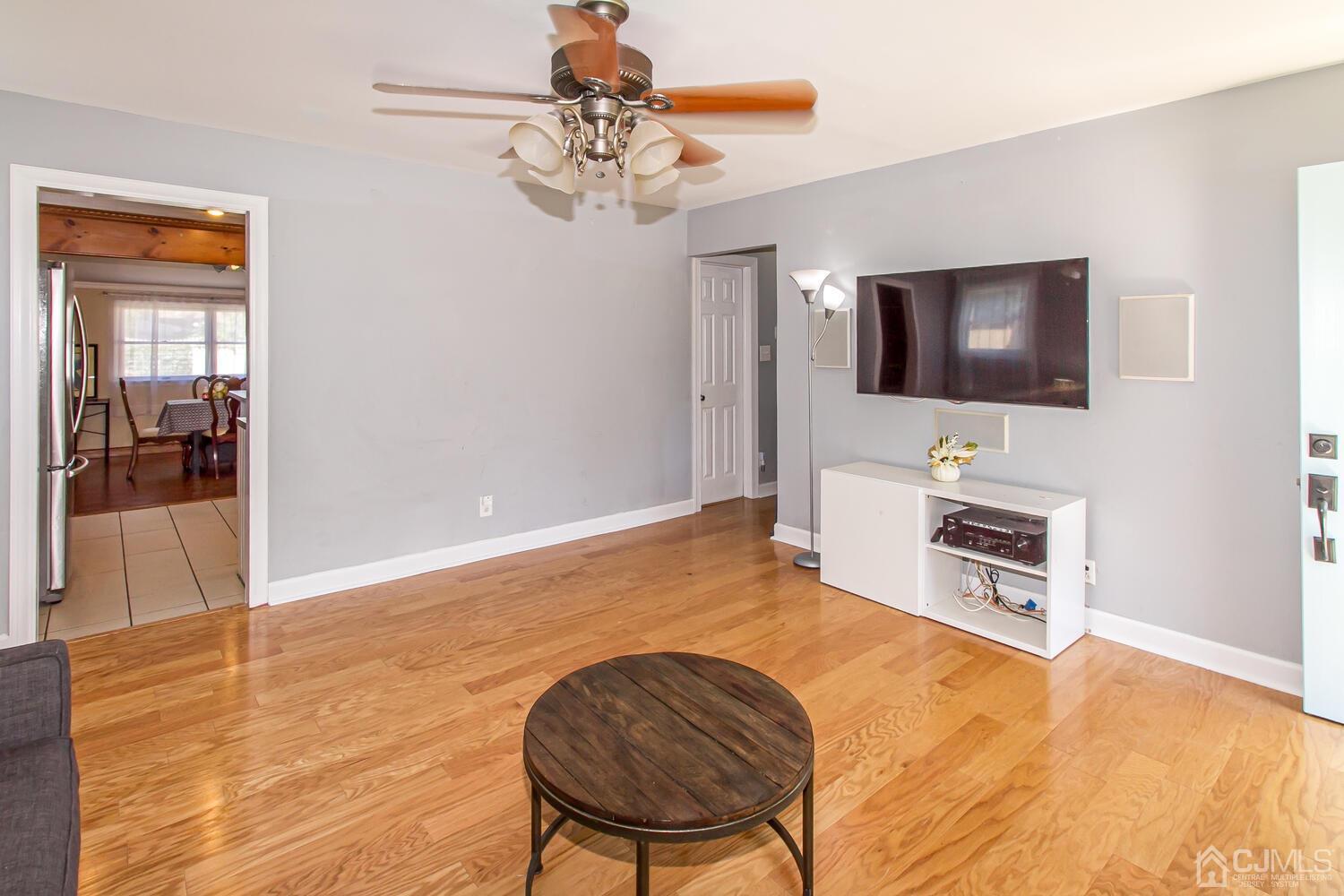 29 Ashley Road Edison, NJ 08817 - Photo 6 of 30 a living room with furniture and a flat screen tv