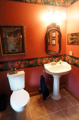 8101 West Bruns Road Monee, IL 60449 - Photo 12 of 25 a bathroom with a toilet a sink and mirror