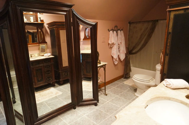 8101 West Bruns Road Monee, IL 60449 - Photo 19 of 25 a bathroom with a granite countertop sink toilet and shower