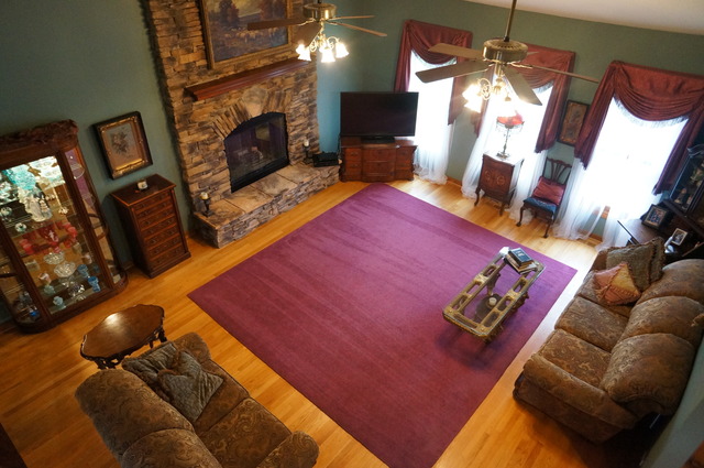 8101 West Bruns Road Monee, IL 60449 - Photo 6 of 25 a living room with furniture and a fireplace