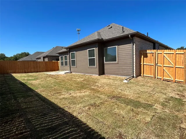 a blue house with a outdoor space