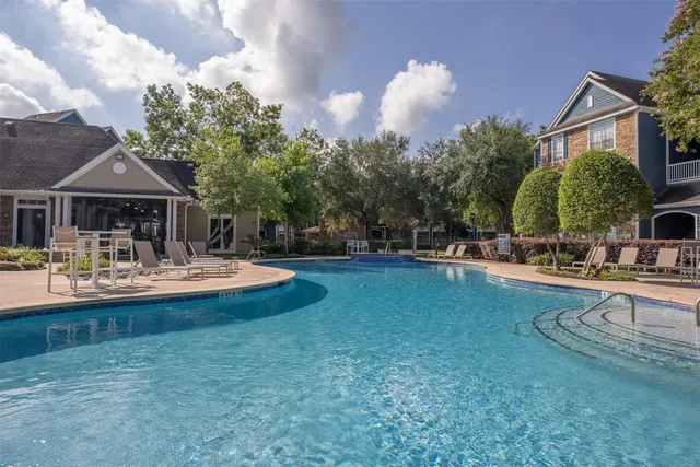 a bathroom with a sink and a shower