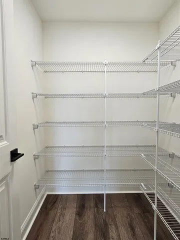 a view of a room with racks on the wall