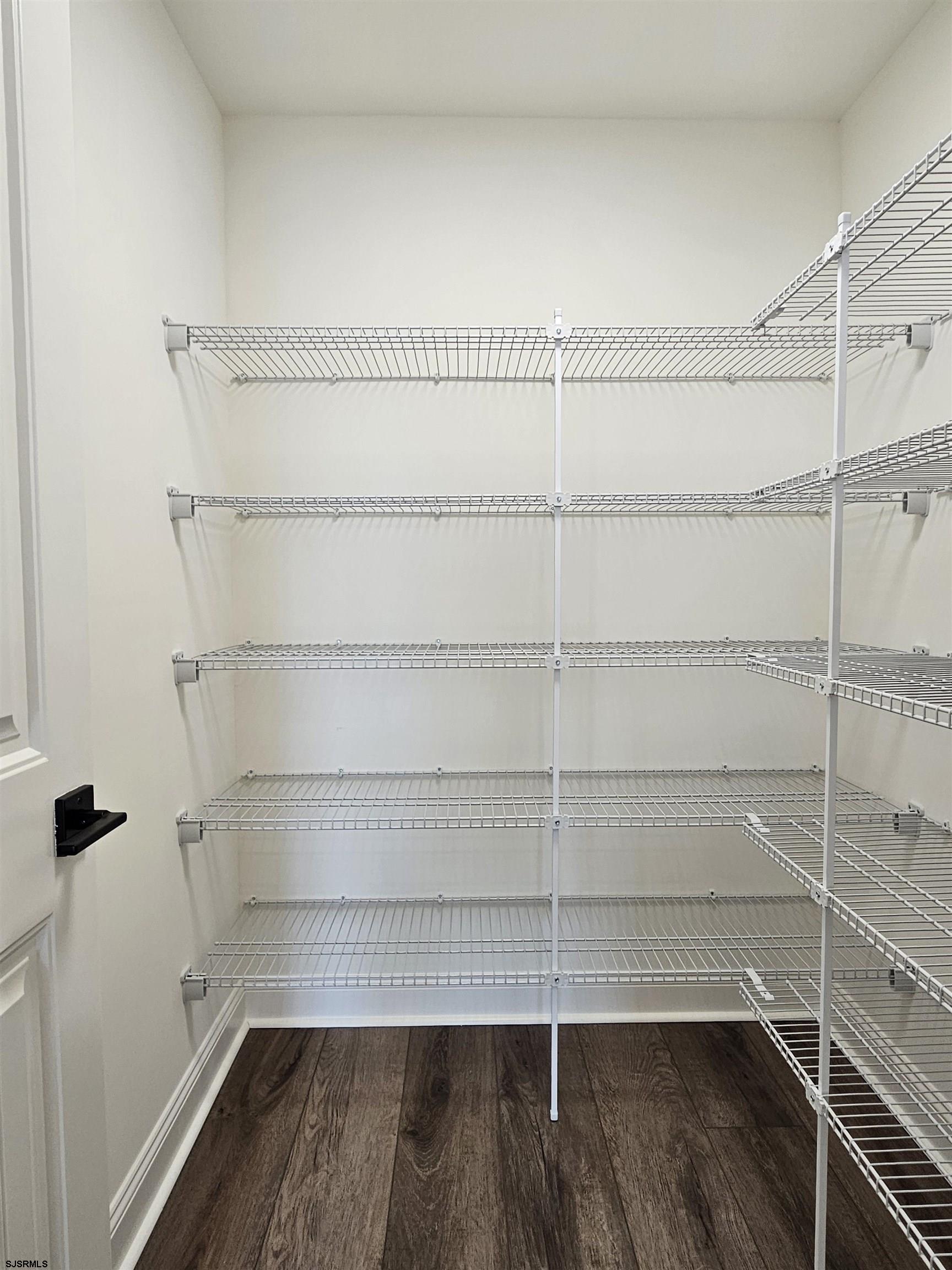 222 8th Street South Brigantine, NJ 08203 - Photo 16 of 27 a view of a room with racks on the wall