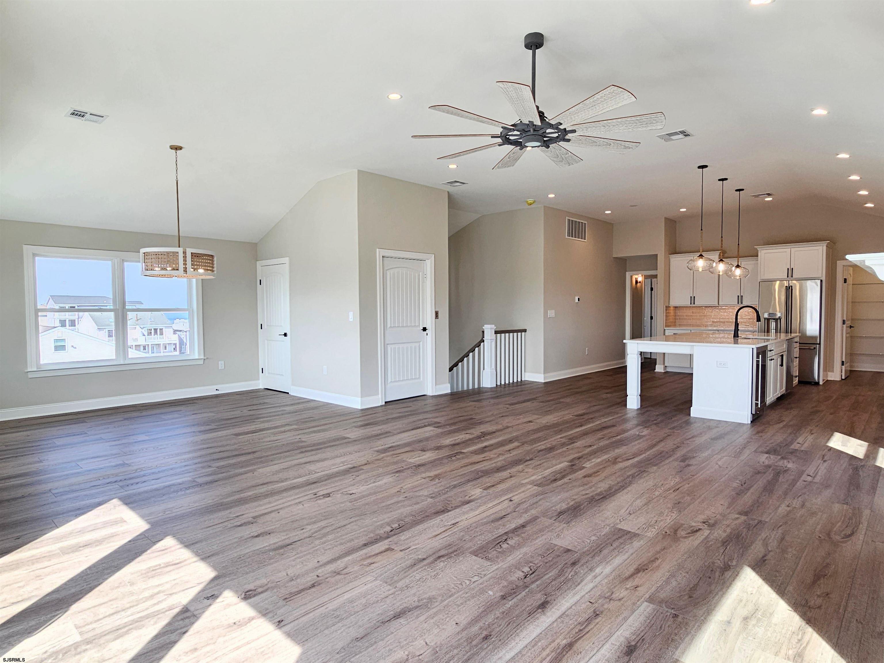 222 8th Street South Brigantine, NJ 08203 - Photo 17 of 27 a view of kitchen with furniture and wooden floor