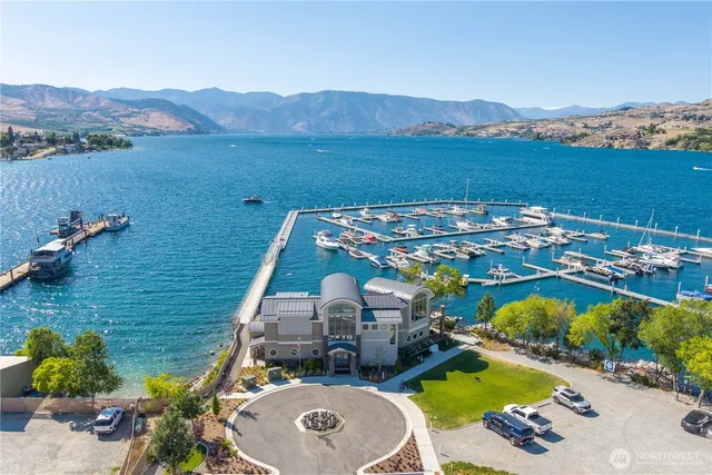 an aerial view of a house with outdoor space swimming pool