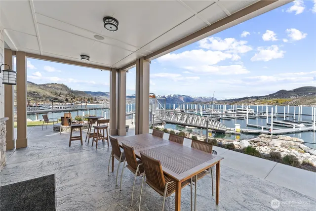 a view of a city from a dining room with furniture window and outside view