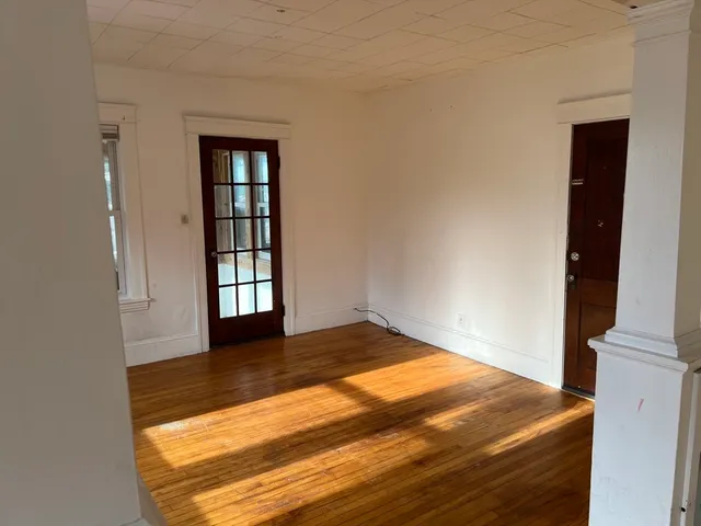 a view of an empty room and window