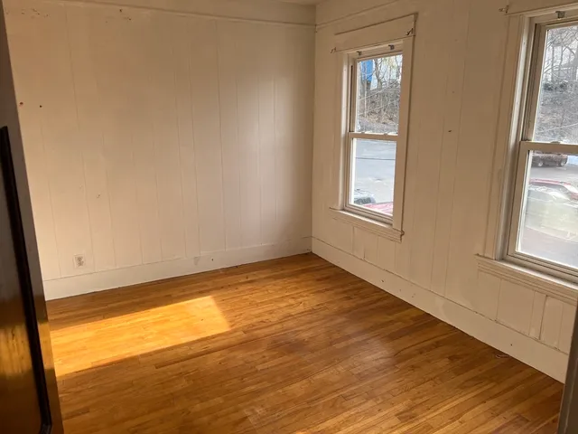 a view of an empty room and window