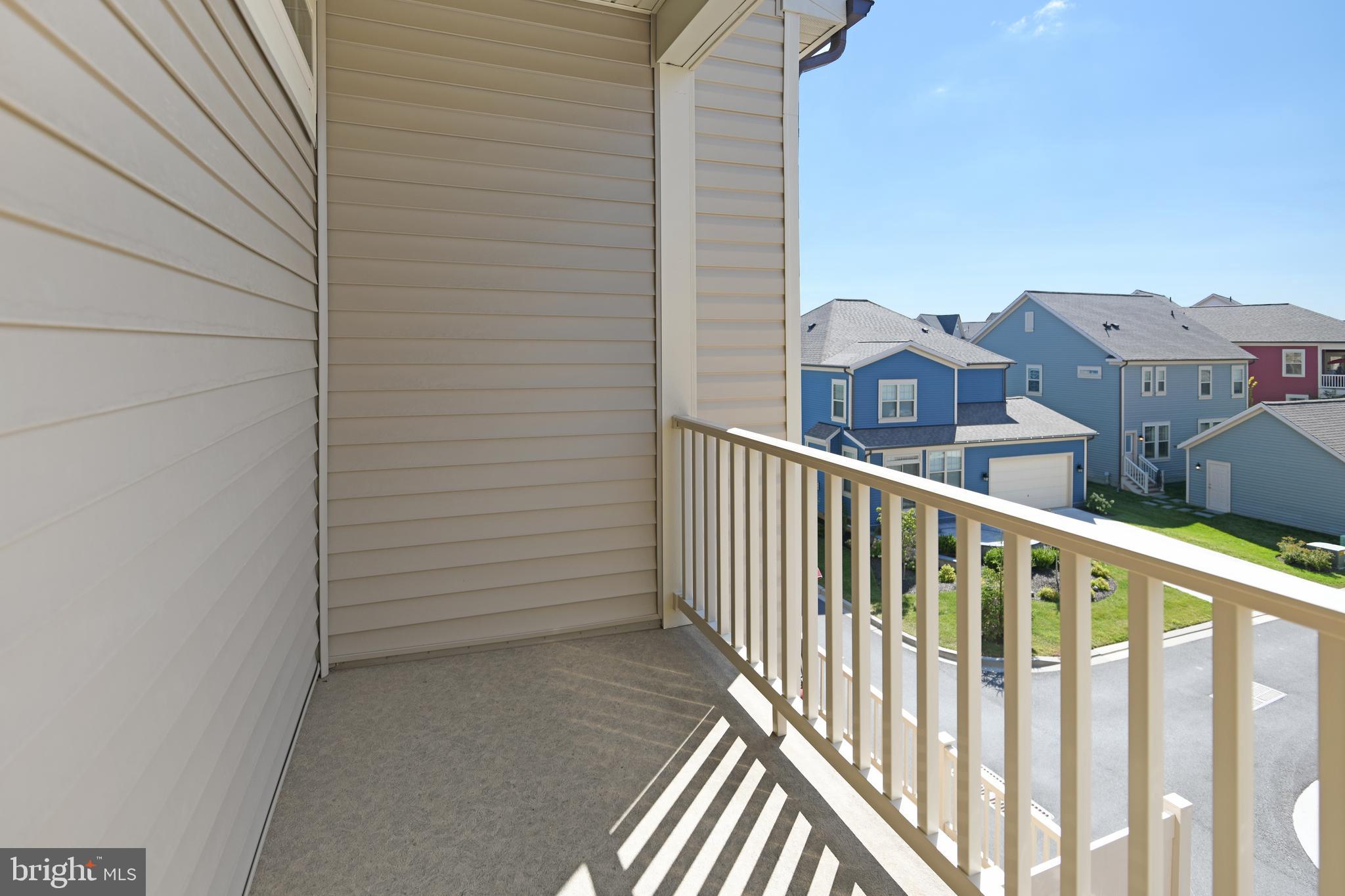 8910 Shady Pines Drive Frederick, MD 21704 - Photo 9 of 22 a view of a balcony with an outdoor space