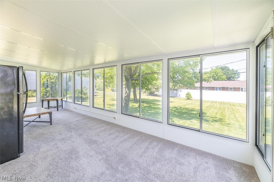 1275 Long Ridge Drive Independence, OH 44131 - Photo 13 of 31 Three Season Sunroom features newer carpeting and as expansive view of the private, wooded rear yard