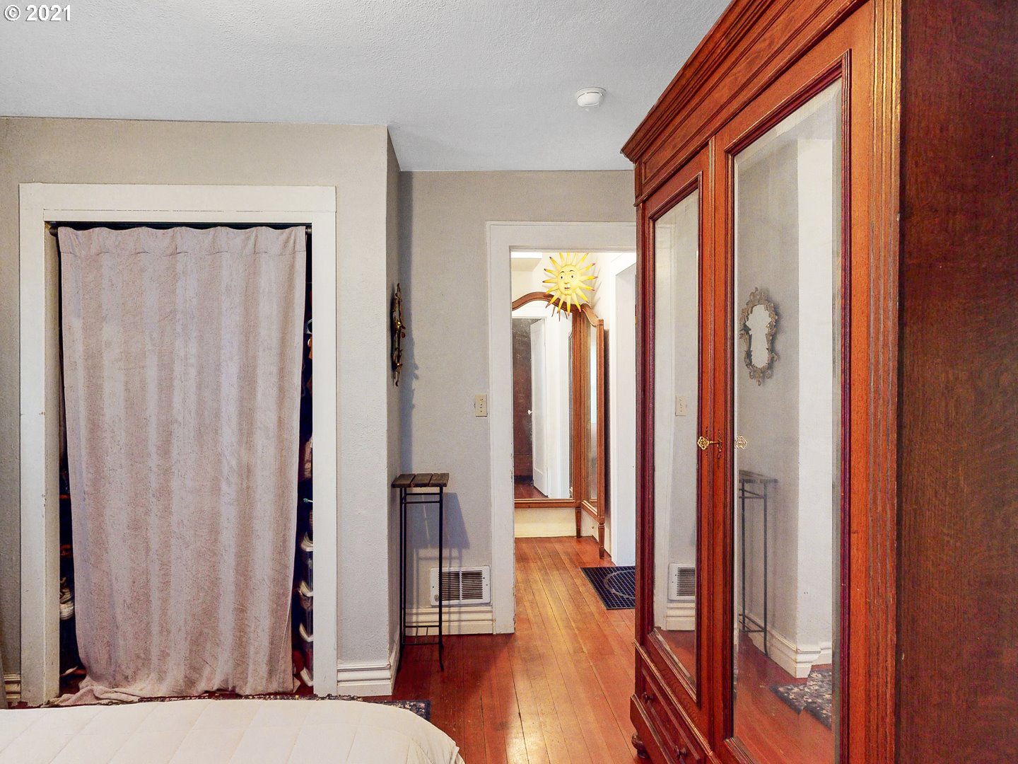 729 South 57th Street Springfield, OR 97478 - Photo 14 of 23 a view of a hallway with wooden floor and stairs