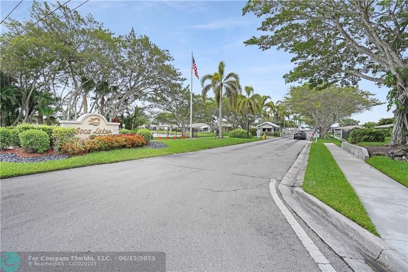 8625 Boca Drive, Unit 12 Boca Raton, FL 33433 - Photo 32 of 42 a view of a street with a houses