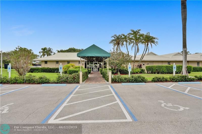 8625 Boca Drive, Unit 12 Boca Raton, FL 33433 - Photo 33 of 42 a view of a backyard and a tree