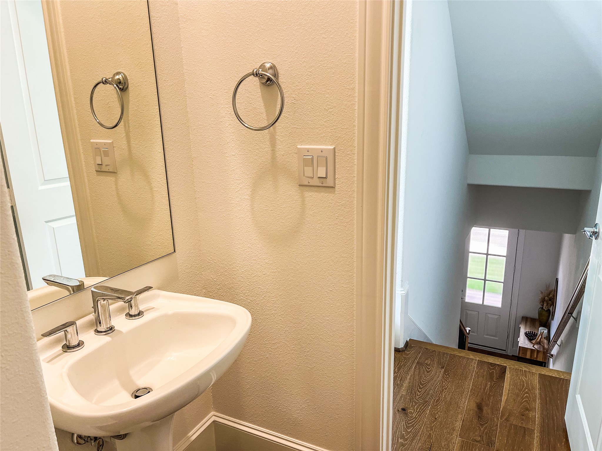 2024 Waterloo Station Road Houston, TX 77045 - Photo 6 of 14 Powder Room is tucked away on the 2nd floor at the top of the stairs from the 1st floor.