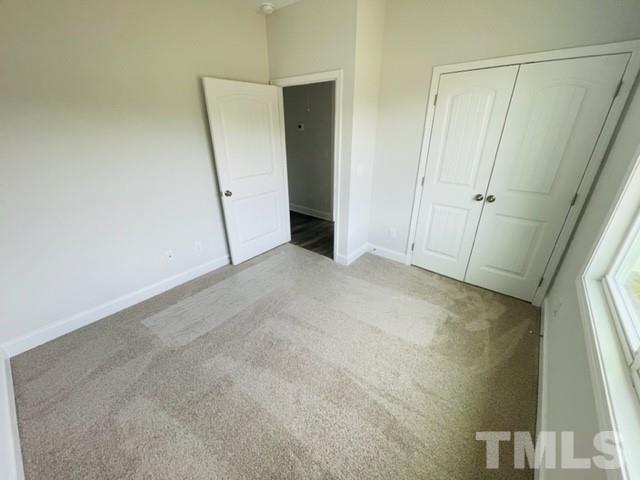 5770 Stott Street Bailey, NC 27807 - Photo 13 of 16 an empty room with a mirror
