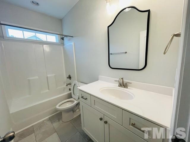 5770 Stott Street Bailey, NC 27807 - Photo 15 of 16 a bathroom with a toilet sink and mirror