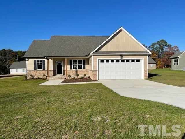 5770 Stott Street Bailey, NC 27807 - Photo 2 of 16 a front view of a house with a yard