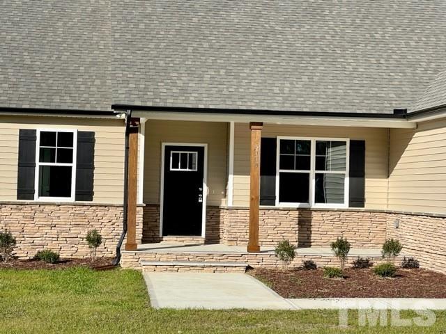 5770 Stott Street Bailey, NC 27807 - Photo 3 of 16 front view of a house with a yard
