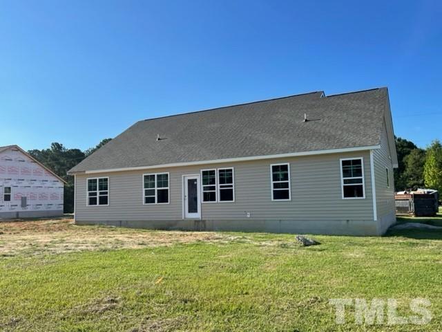 5770 Stott Street Bailey, NC 27807 - Photo 4 of 16 a house view with a garden space