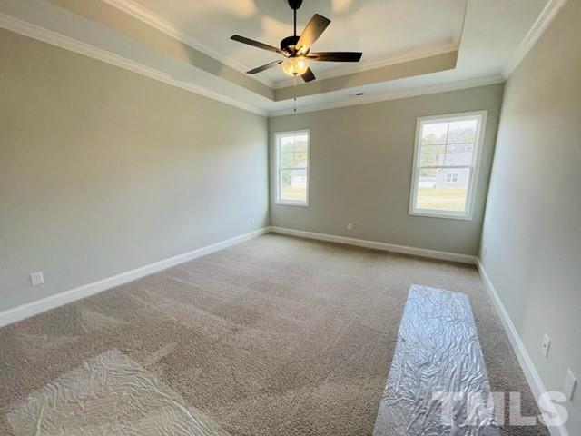 5770 Stott Street Bailey, NC 27807 - Photo 10 of 16 a view of a big room with windows and chandelier fan