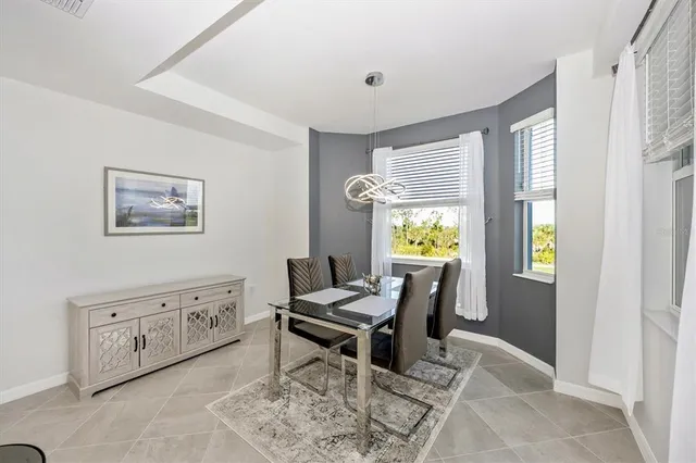 a bathroom with a shower sink vanity mirror and toilet