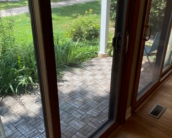 a view of a house with a backyard