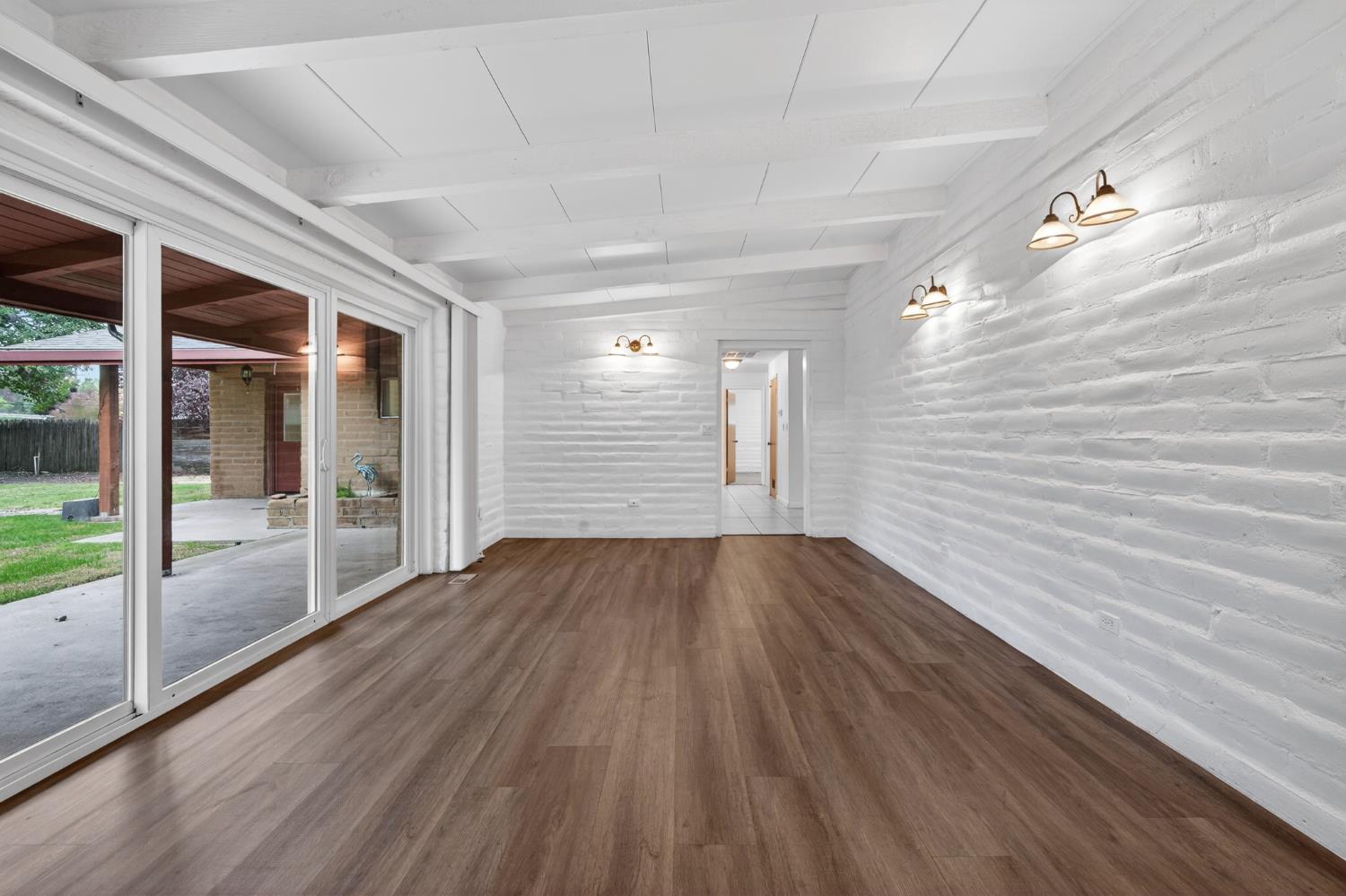 1140 West Lincoln Road Stockton, CA 95207 - Photo 30 of 45 a view of hallway with wooden floor