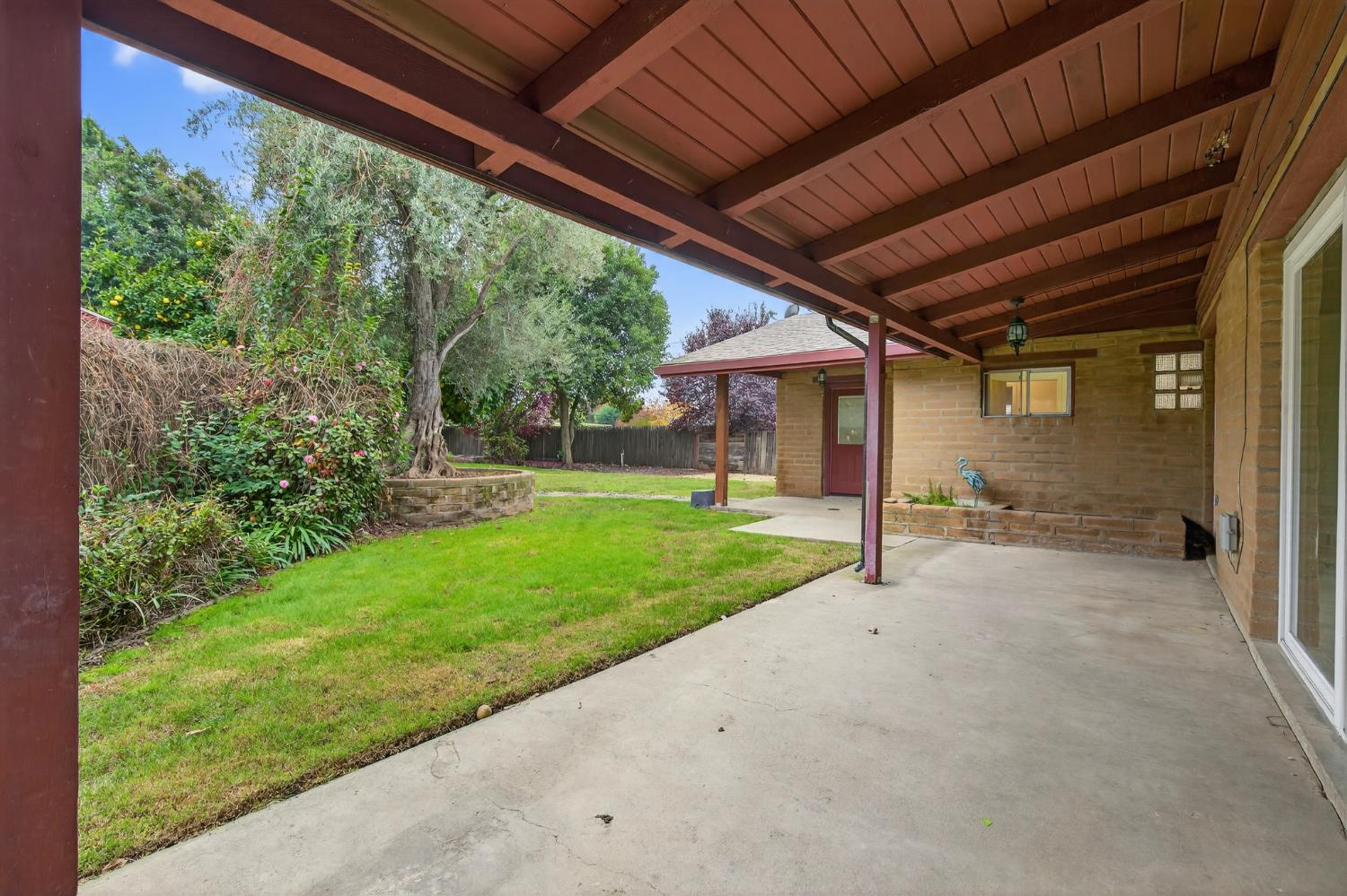 1140 West Lincoln Road Stockton, CA 95207 - Photo 32 of 45 a view of a house with backyard and porch