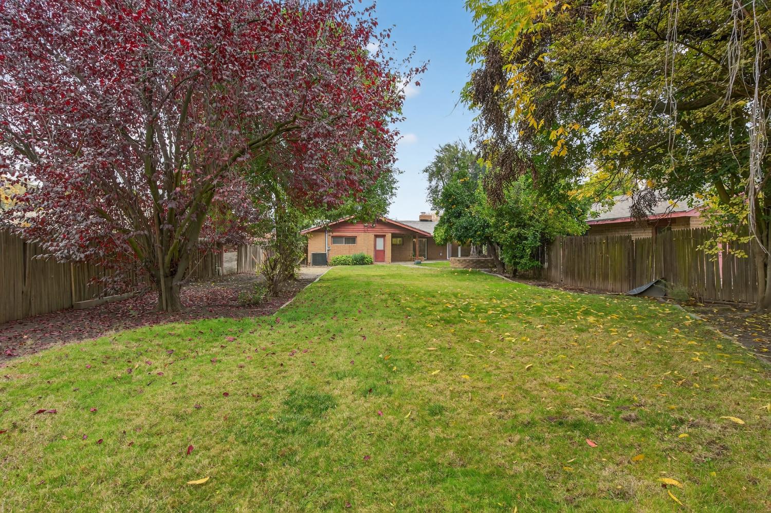 1140 West Lincoln Road Stockton, CA 95207 - Photo 37 of 45 a view of a house with a backyard