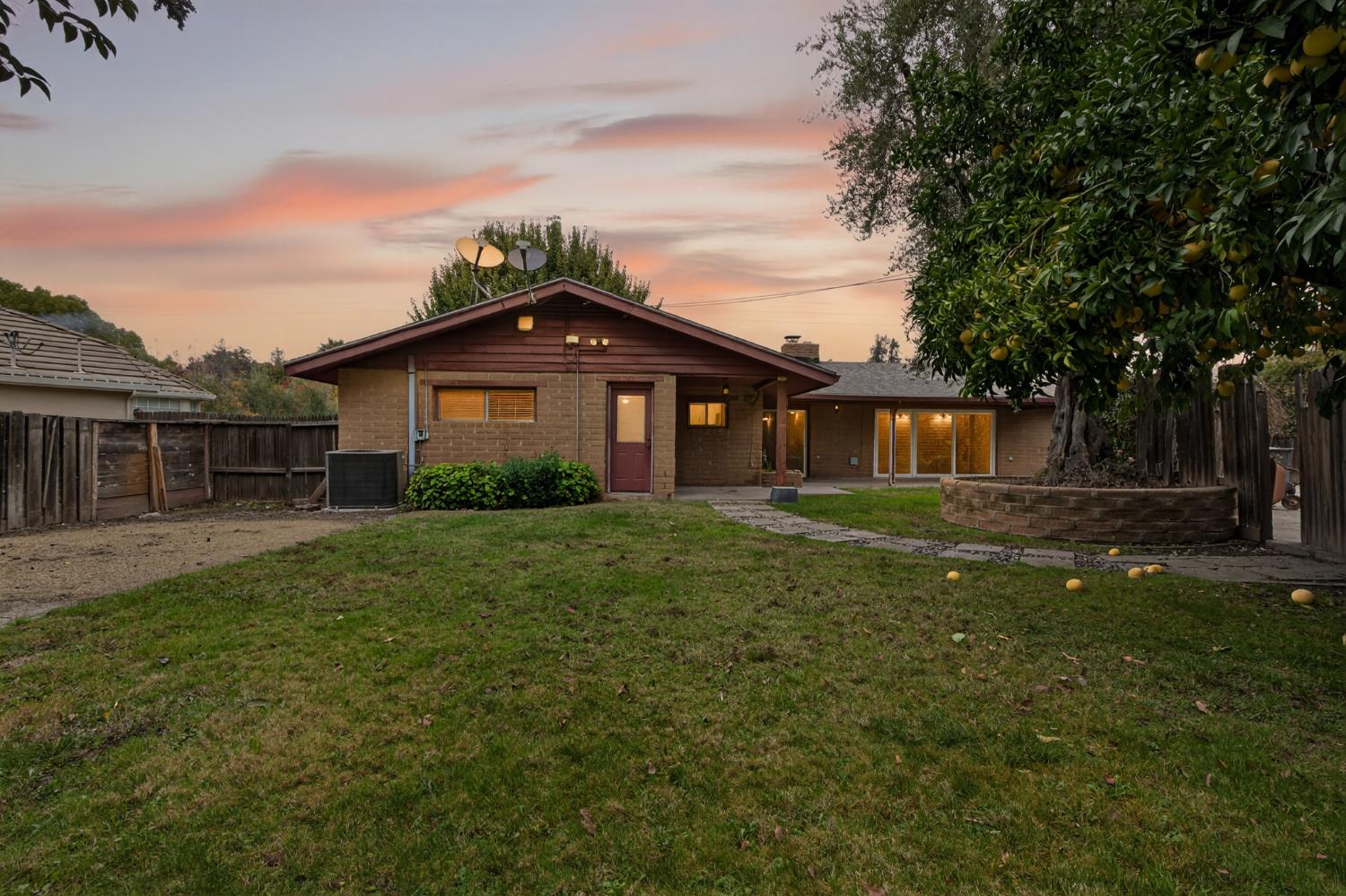 1140 West Lincoln Road Stockton, CA 95207 - Photo 39 of 45 a front view of a house with a yard