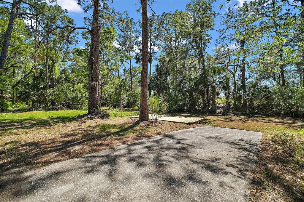 40325 Emeralda Island Road Leesburg, FL 34788 - Photo 27 of 35 Boat ramp to canal and dock ~