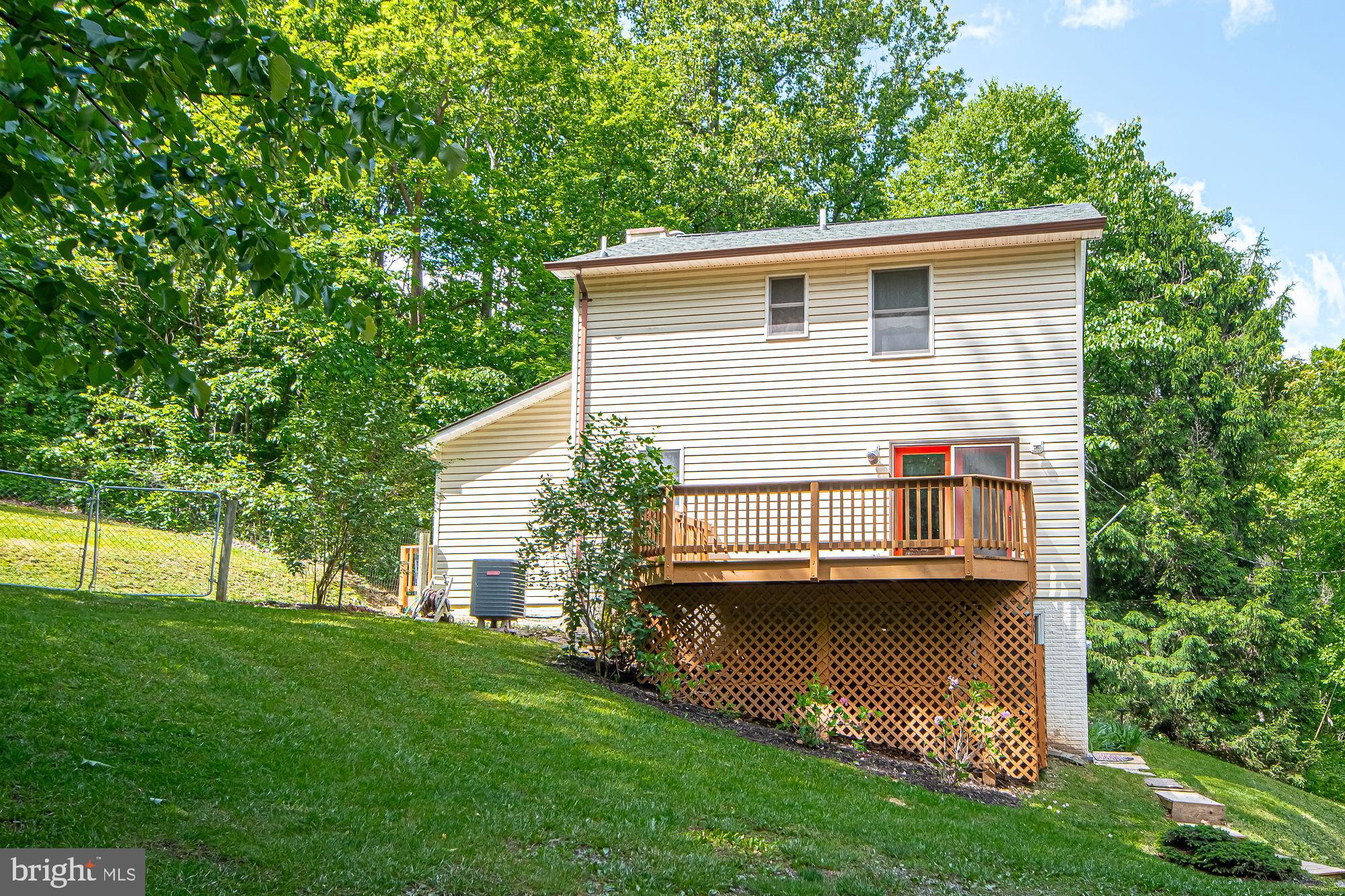 302 Parkside Road Linden, VA 22642 - Photo 3 of 30 a view of a house with backyard and sitting area