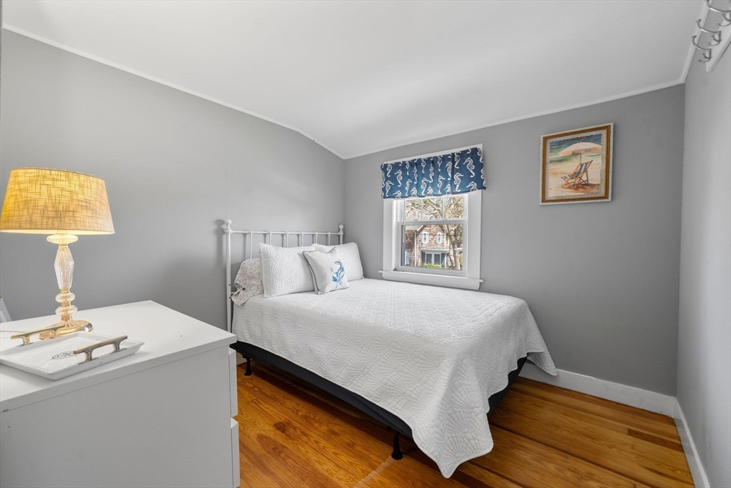 13 Hamilton Road Dennis, MA 02639 - Photo 11 of 40 a bedroom with a bed and a window