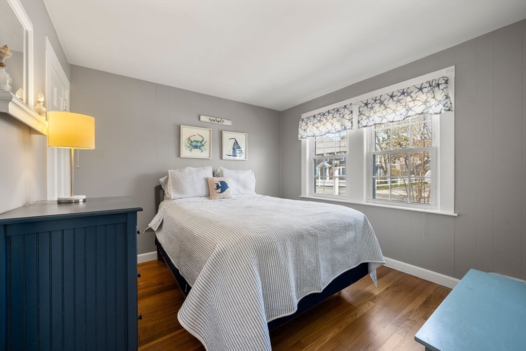 13 Hamilton Road Dennis, MA 02639 - Photo 15 of 40 a bedroom with a bed and a window