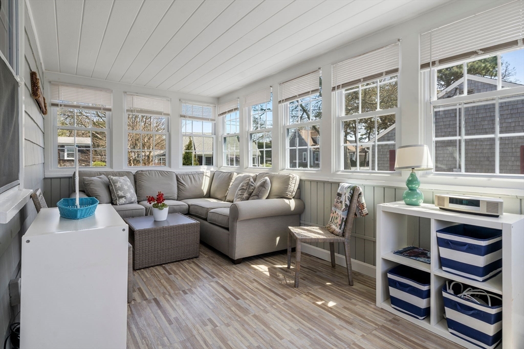 13 Hamilton Road Dennis, MA 02639 - Photo 18 of 40 a living room with furniture and windows