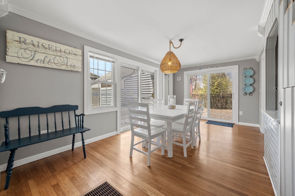13 Hamilton Road Dennis, MA 02639 - Photo 22 of 40 a view of a dining room with furniture window and wooden floor