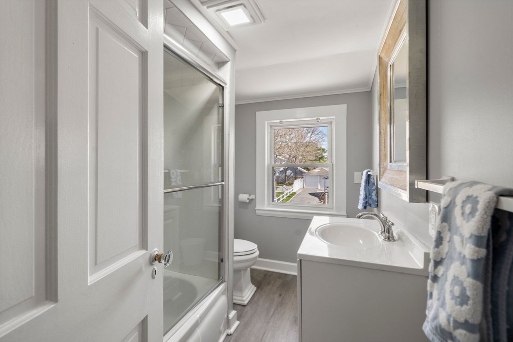 13 Hamilton Road Dennis, MA 02639 - Photo 10 of 40 a bathroom with a sink a toilet and a bathtub