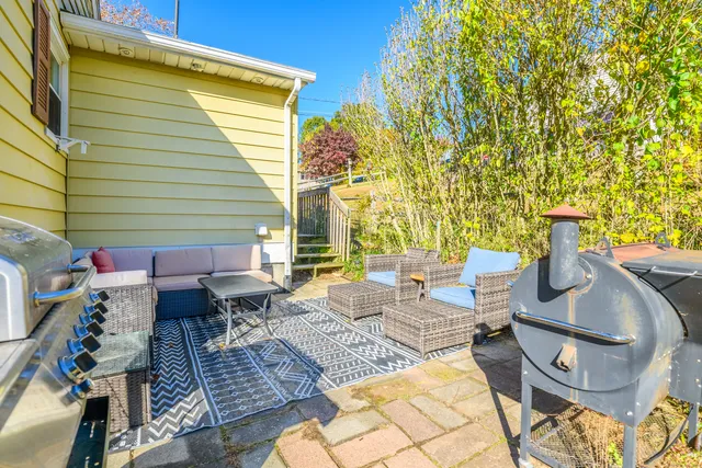 swimming pool view with a seating space