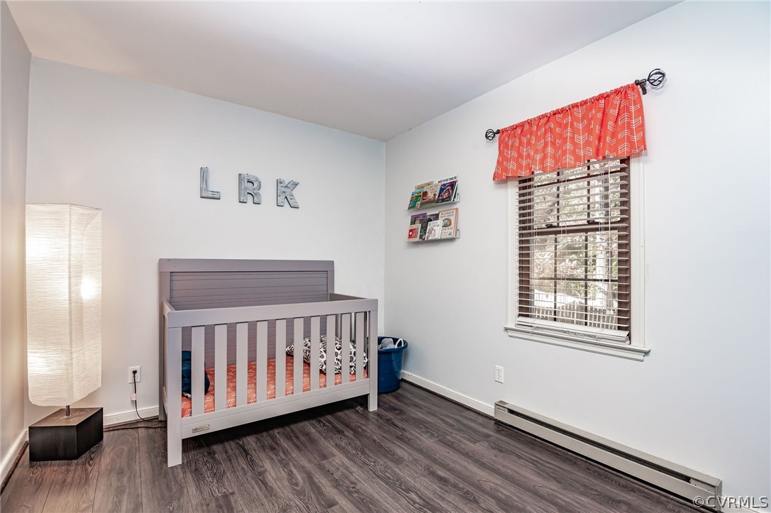 14406 Heather Stone Drive Chester, VA 23836 - Photo 14 of 29 a view of a bedroom with wooden floor