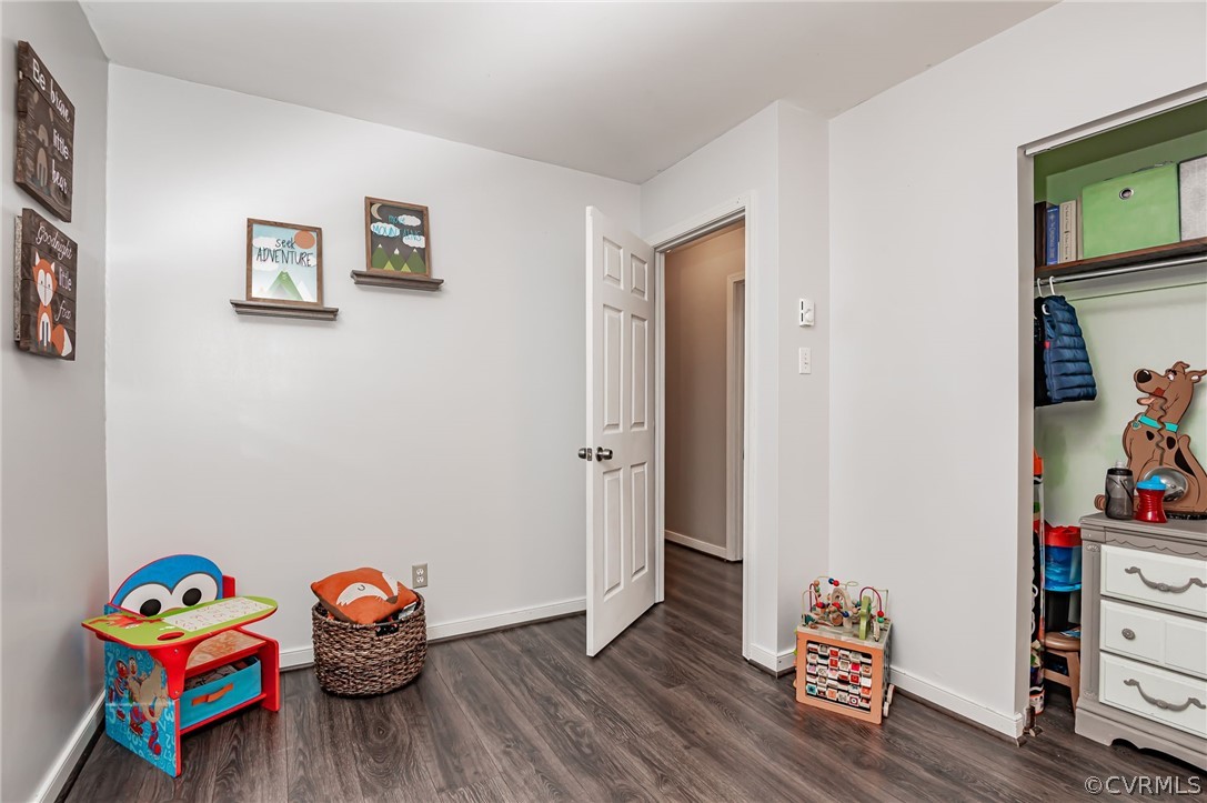14406 Heather Stone Drive Chester, VA 23836 - Photo 16 of 29 a play room with toys and wooden floor