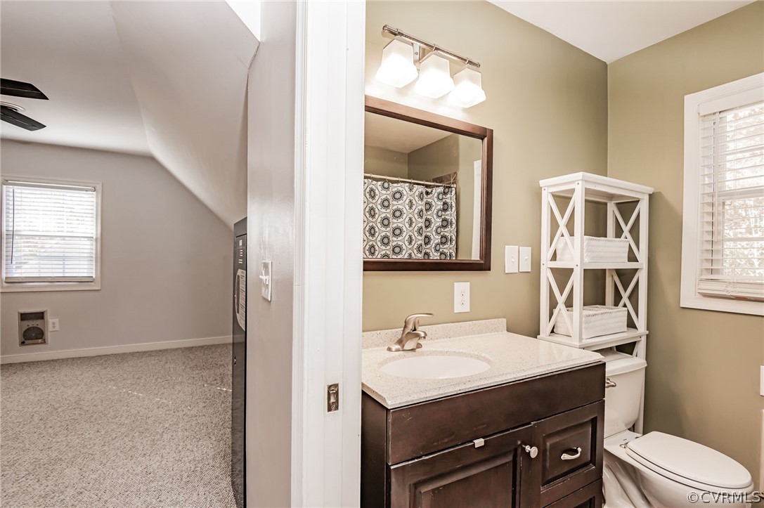 14406 Heather Stone Drive Chester, VA 23836 - Photo 23 of 29 a bathroom with a sink toilet and mirror