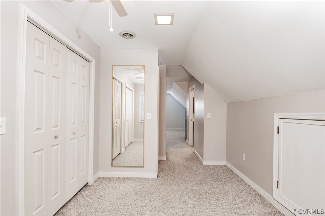14406 Heather Stone Drive Chester, VA 23836 - Photo 24 of 29 a view of a hallway with wooden shelves